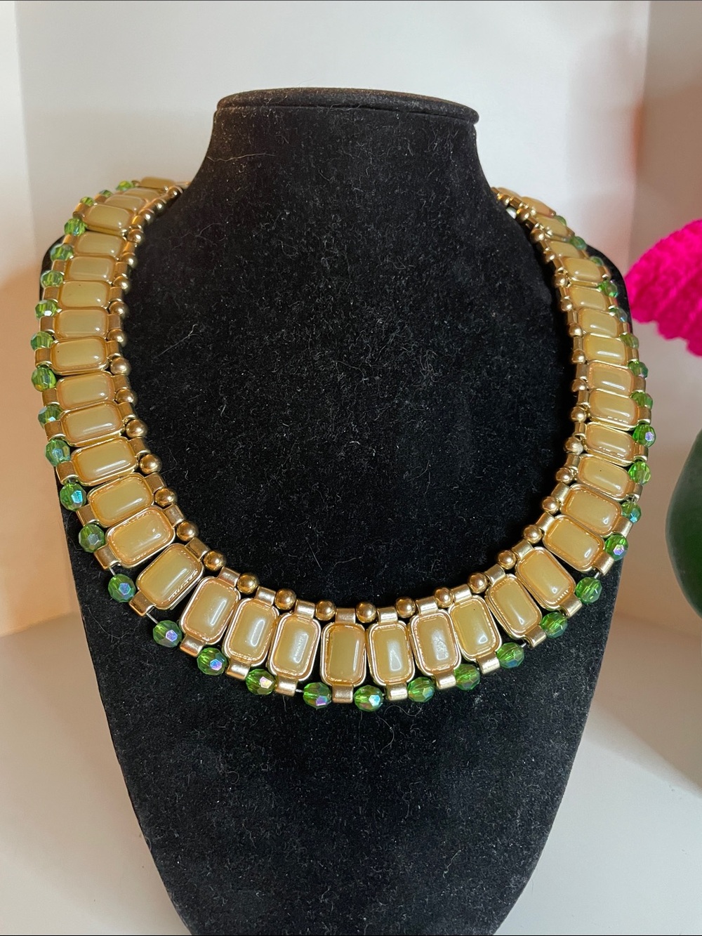 Gold-Tone Necklace with Cream Stones and Green Bead Accents